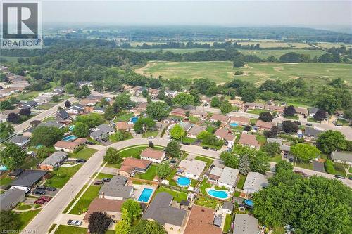 Aerial perspective showcasing residential properties with varied rooflines and landscaped yards - 186 Glenmor Drive, Caledonia, ON - Outdoor With View