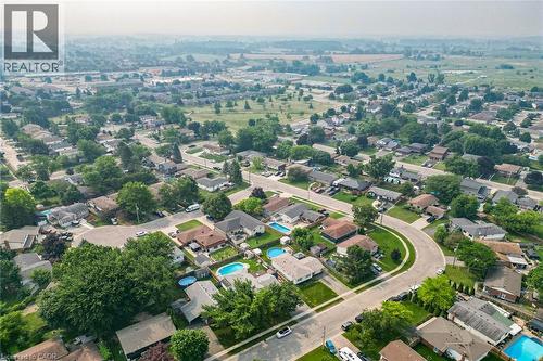 Residential neighborhood with mature trees and a curved street layout - 186 Glenmor Drive, Caledonia, ON - Outdoor With View