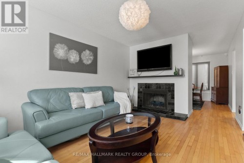 48 Sample Road, Ottawa, ON - Indoor Photo Showing Living Room With Fireplace
