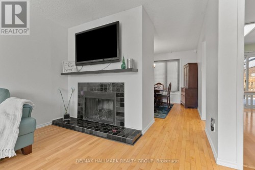 48 Sample Road, Ottawa, ON - Indoor Photo Showing Living Room With Fireplace