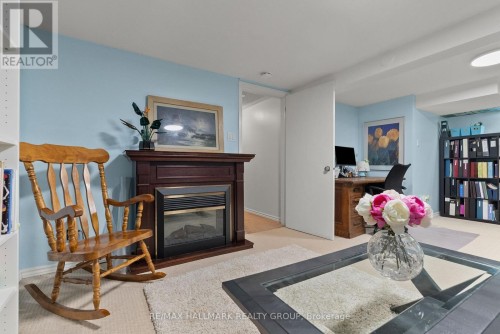48 Sample Road, Ottawa, ON - Indoor Photo Showing Living Room With Fireplace