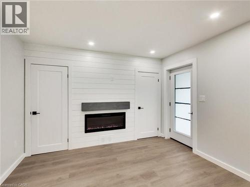 67 Cope Street, Hamilton, ON - Indoor Photo Showing Other Room With Fireplace