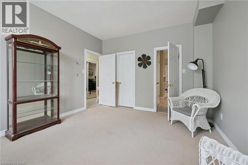 Light gray wall paint complemented by white trim and a neutral carpet - 23 Knack Lane, Cambridge, ON - Indoor