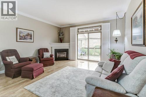 20 Isherwood Avenue Unit# 109, Cambridge, ON - Indoor Photo Showing Living Room With Fireplace