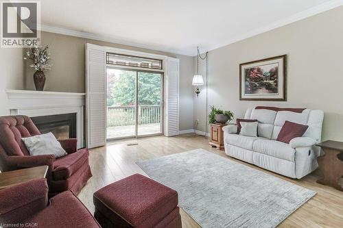20 Isherwood Avenue Unit# 109, Cambridge, ON - Indoor Photo Showing Living Room With Fireplace