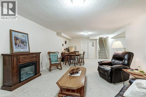 20 Isherwood Avenue Unit# 109, Cambridge, ON - Indoor Photo Showing Living Room With Fireplace