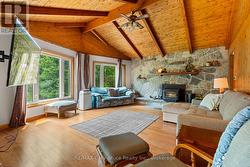 A large living room ft. vaulted ceilings. - 