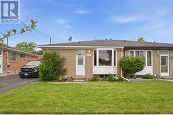322 ROSEDALE DRIVE Whitby, ON L1N 1Z3