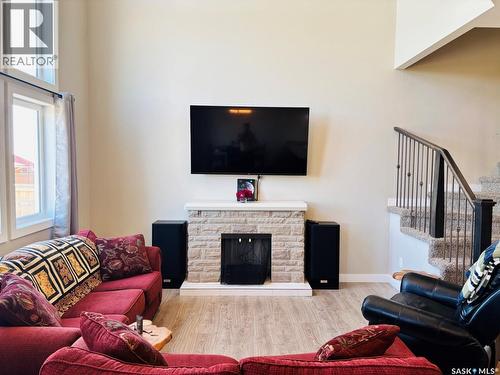 255 Eaton Crescent, Saskatoon, SK - Indoor Photo Showing Living Room With Fireplace
