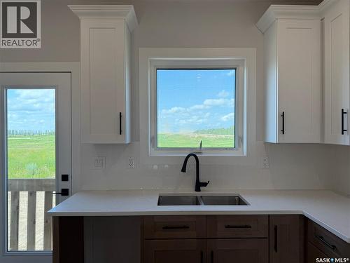 11 Aspen Place, Humboldt, SK - Indoor Photo Showing Kitchen With Double Sink