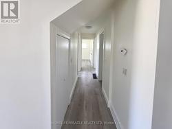 Hallway to rooms on main floor - 
