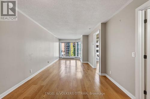 This image has been virtually staged. - 604 - 138 Somerset Street W, Ottawa, ON - Indoor Photo Showing Other Room