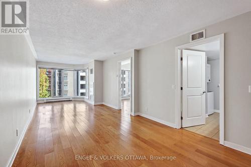 This image has been virtually staged. - 604 - 138 Somerset Street W, Ottawa, ON - Indoor Photo Showing Other Room