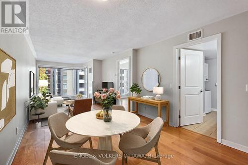 This image has been virtually staged. - 604 - 138 Somerset Street W, Ottawa, ON - Indoor Photo Showing Dining Room