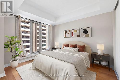 This image has been virtually staged. - 604 - 138 Somerset Street W, Ottawa, ON - Indoor Photo Showing Bedroom