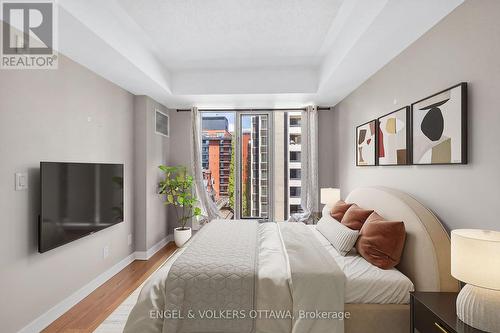 This image has been virtually staged. - 604 - 138 Somerset Street W, Ottawa, ON - Indoor Photo Showing Bedroom