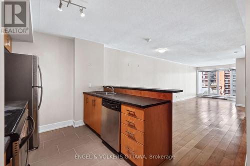 This image has been virtually staged. - 604 - 138 Somerset Street W, Ottawa, ON - Indoor Photo Showing Kitchen With Double Sink