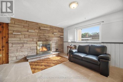 20 Malcolm Crescent, Brampton, ON - Indoor Photo Showing Living Room With Fireplace