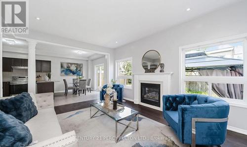 91 Laprade Square, Clarington, ON - Indoor Photo Showing Living Room With Fireplace