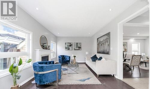 91 Laprade Square, Clarington, ON - Indoor Photo Showing Living Room With Fireplace