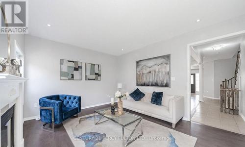 91 Laprade Square, Clarington, ON - Indoor Photo Showing Living Room With Fireplace