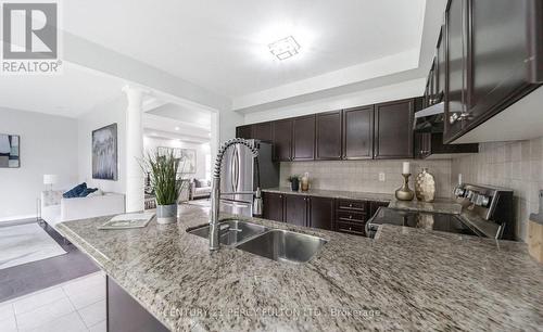 91 Laprade Square, Clarington, ON - Indoor Photo Showing Kitchen With Double Sink With Upgraded Kitchen