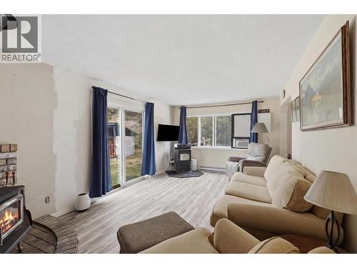 557 Squilax-Turtle Valley Road, Chase, BC - Indoor Photo Showing Living Room With Fireplace