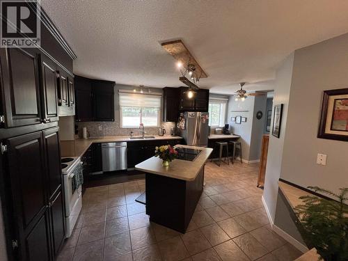 19 Raven Crescent, Fort Nelson, BC - Indoor Photo Showing Kitchen