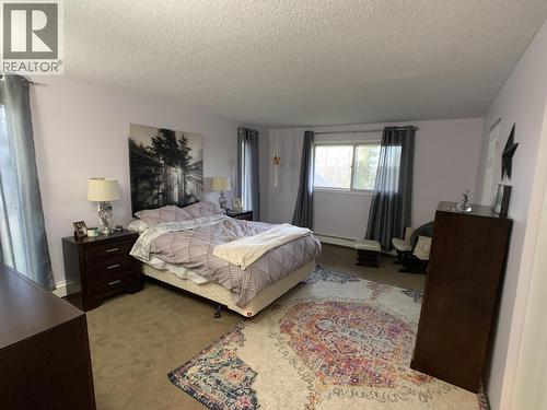 19 Raven Crescent, Fort Nelson, BC - Indoor Photo Showing Bedroom