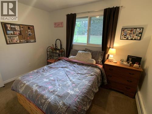 19 Raven Crescent, Fort Nelson, BC - Indoor Photo Showing Bedroom
