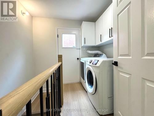 Separate Entrance - 31 Cavalry Trail, Markham, ON - Indoor Photo Showing Laundry Room