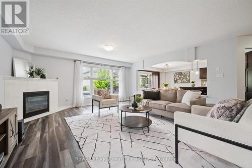 138 Flanders Road, Waterloo, ON - Indoor Photo Showing Living Room With Fireplace