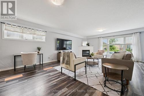 138 Flanders Road, Waterloo, ON - Indoor Photo Showing Living Room With Fireplace