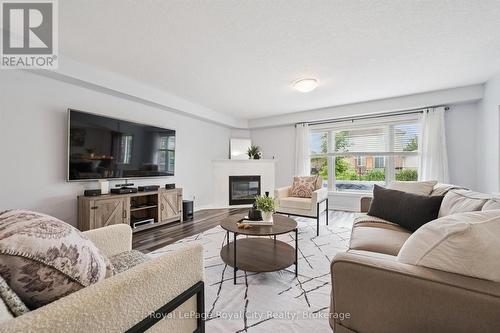 138 Flanders Road, Waterloo, ON - Indoor Photo Showing Living Room With Fireplace
