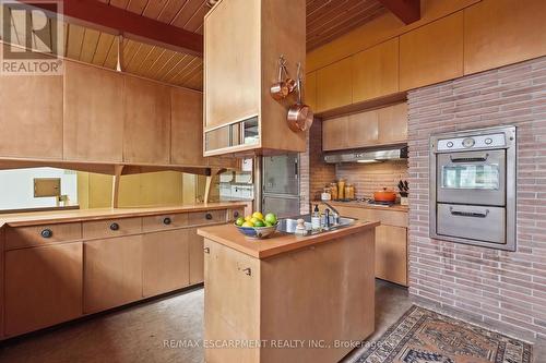 Virtually Staged -Kit. featuring wood cabinetry - 264 Mountain Brow Boulevard, Hamilton, ON - Indoor Photo Showing Kitchen