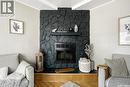408 Mullin Avenue E, Regina, SK  - Indoor Photo Showing Living Room With Fireplace 