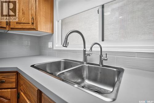 1027 Vaughan Street, Moose Jaw, SK - Indoor Photo Showing Kitchen With Double Sink