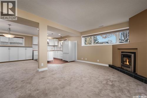1027 Vaughan Street, Moose Jaw, SK - Indoor Photo Showing Other Room With Fireplace