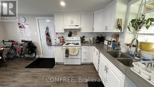 21 Monroe Avenue, Cornwall, ON - Indoor Photo Showing Kitchen With Double Sink