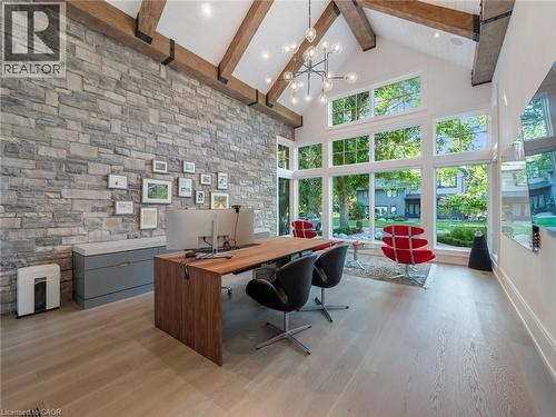 Vaulted ceiling featuring exposed wood beams and architectural lighting - 140 Secord Lane, Burlington, ON - Indoor Photo Showing Office