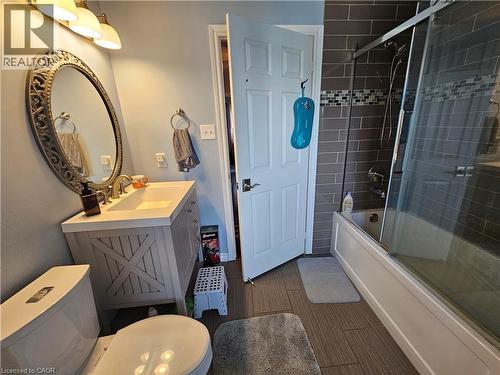 Another view of family bathroom  with vanity and shower / bath combination with glass door - 20 Bird Court, Cambridge, ON - Indoor Photo Showing Bathroom
