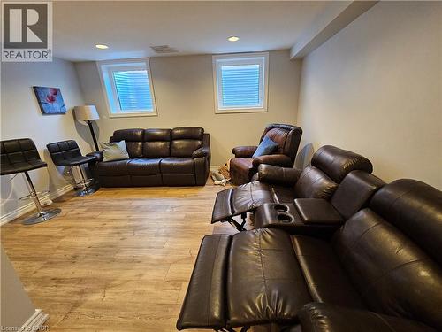 Rec room in basemetn  with light wood-style floors and recessed lighting - 20 Bird Court, Cambridge, ON - Indoor