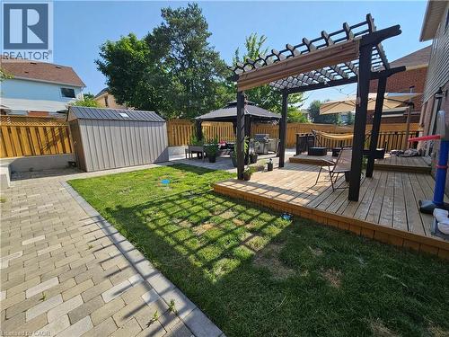 Fenced backyard with a gazebo, a shed, a deck, a patio, and a pergola - 20 Bird Court, Cambridge, ON - Outdoor With Deck Patio Veranda