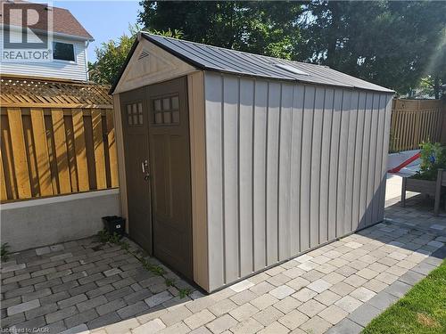 View of shed with a fenced backyard - 20 Bird Court, Cambridge, ON - Outdoor With Exterior