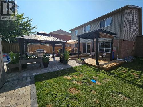 Back of house with a pergola, a wooden deck, a gazebo,  and a patio area. - 20 Bird Court, Cambridge, ON - Outdoor With Deck Patio Veranda