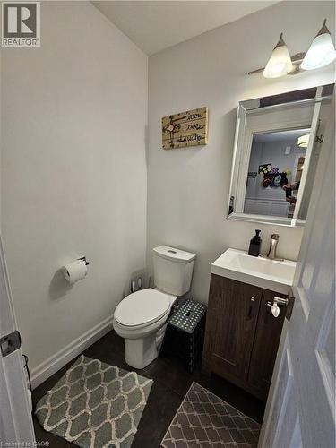 Half bathroom (guest bath) at entrance of home - 20 Bird Court, Cambridge, ON - Indoor Photo Showing Bathroom