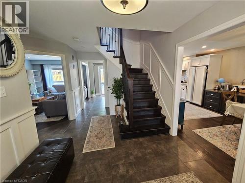 Entrance foyer featuring stairs and a decorative wall - 20 Bird Court, Cambridge, ON - Indoor Photo Showing Other Room