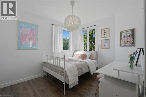 Bright room featuring wood-finish flooring and white walls - 5779 Third Line, Guelph/Eramosa, ON - Indoor Photo Showing Bedroom