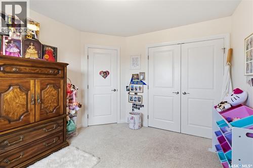 723 Bellmont Court, Saskatoon, SK - Indoor Photo Showing Bedroom