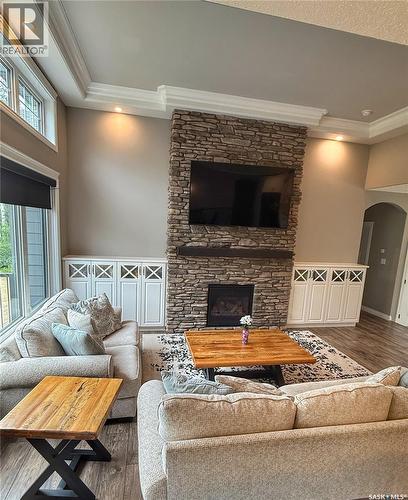 214 Hillside Drive, Tobin Lake, SK - Indoor Photo Showing Living Room With Fireplace